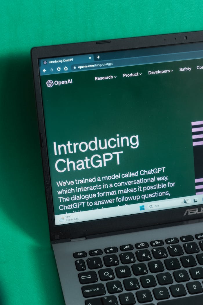 Laptop screen displaying the introductory page of ChatGPT on OpenAI